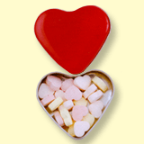 Heart shaped tin with heart shaped sweets